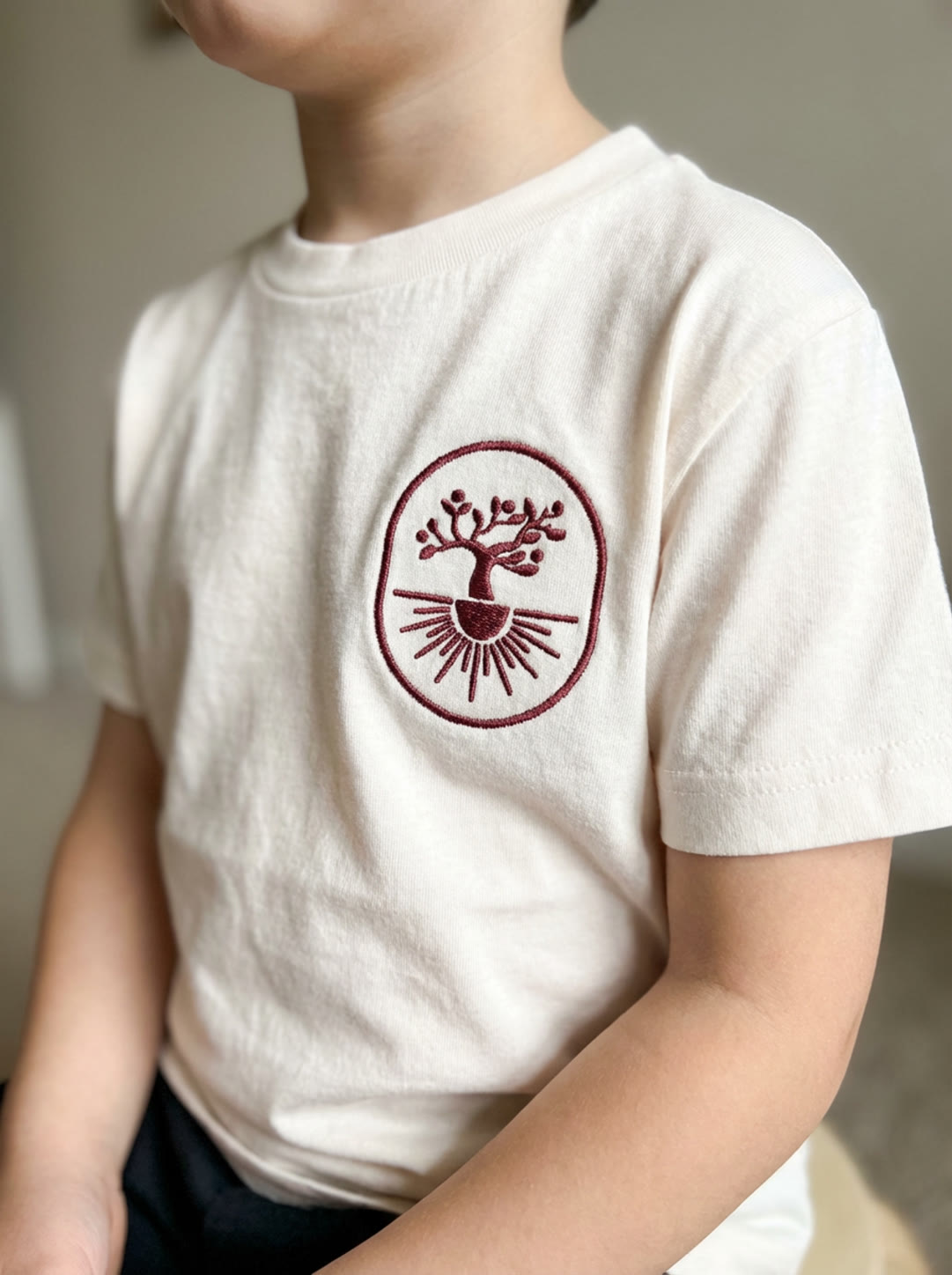 Root and Kin embroidered children's apparel