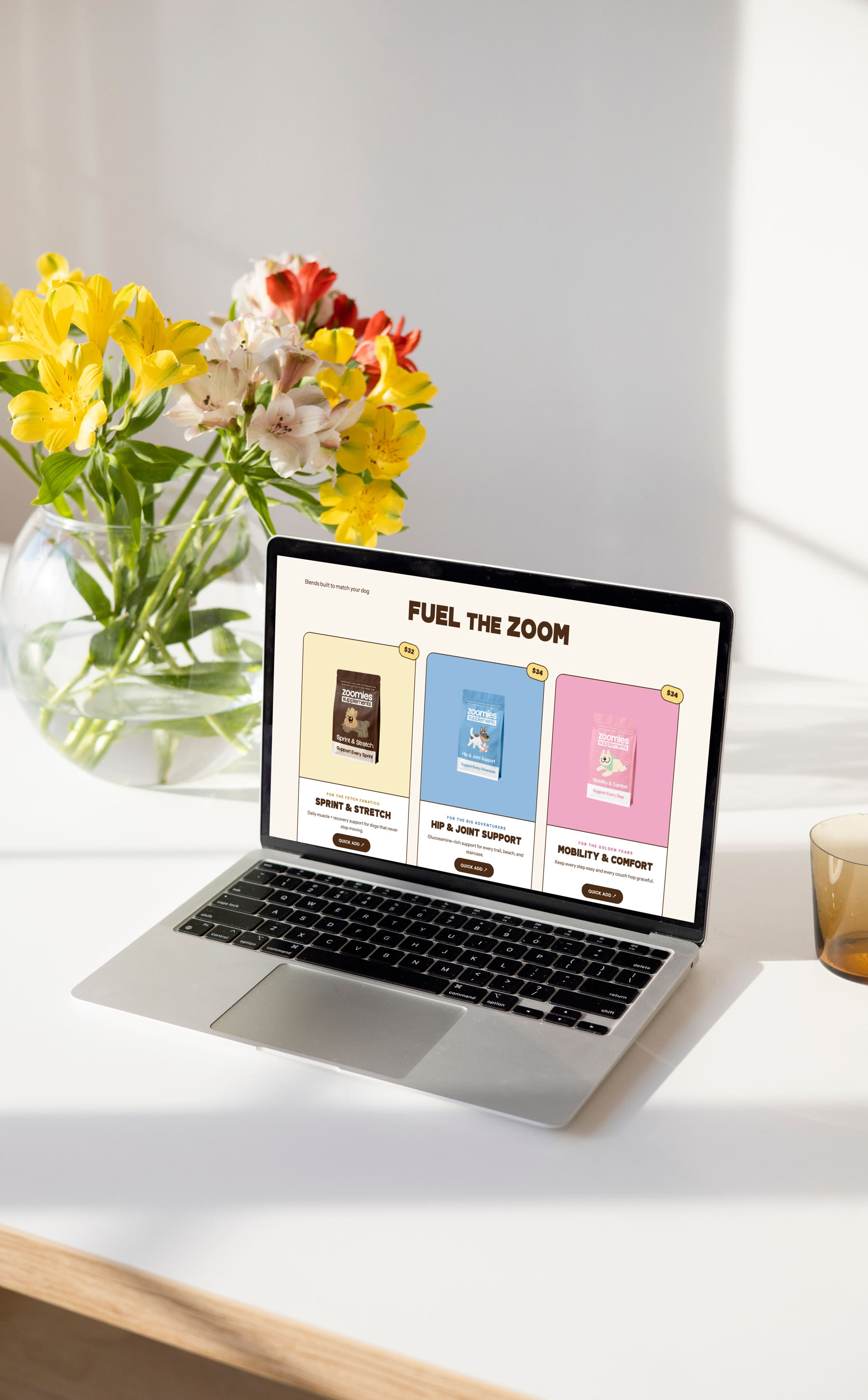 Zoomies supplements website on a laptop